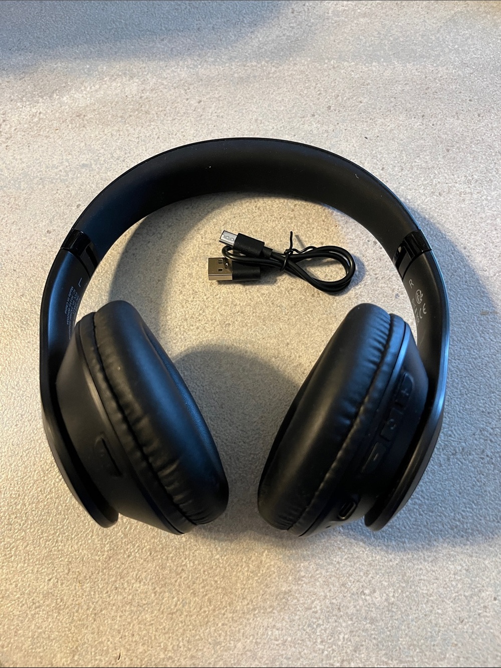 Black Over-Ear Wireless Headphones with USB Charging Cable